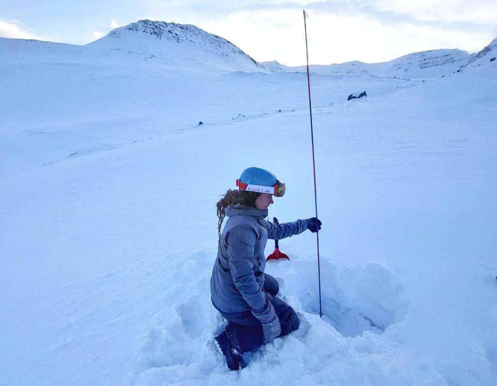 Juho Karhu measuring snowpack